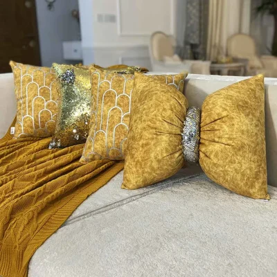 ست کوسن 4 عددی طرح کسری مخمل خردلی ابروبادی چرم نقره ای